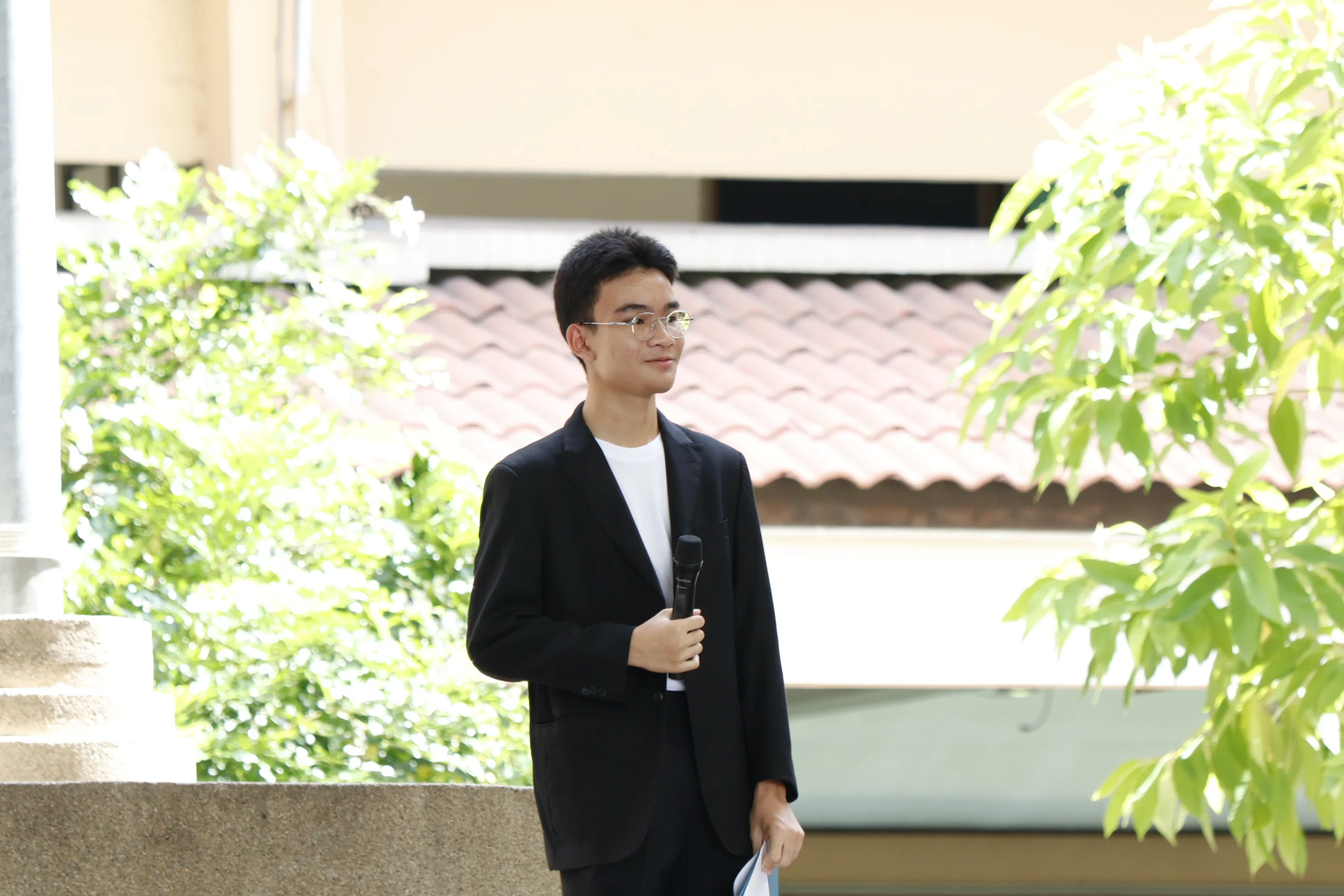 Pudis Stanmuang speaking at an event